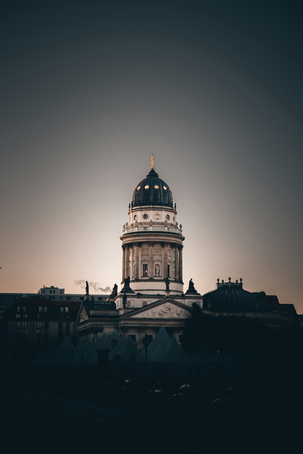 white and black concrete building during sunset