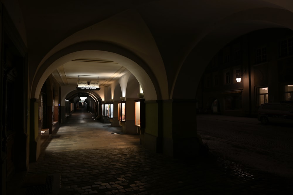 hallway with lights turned on during night time