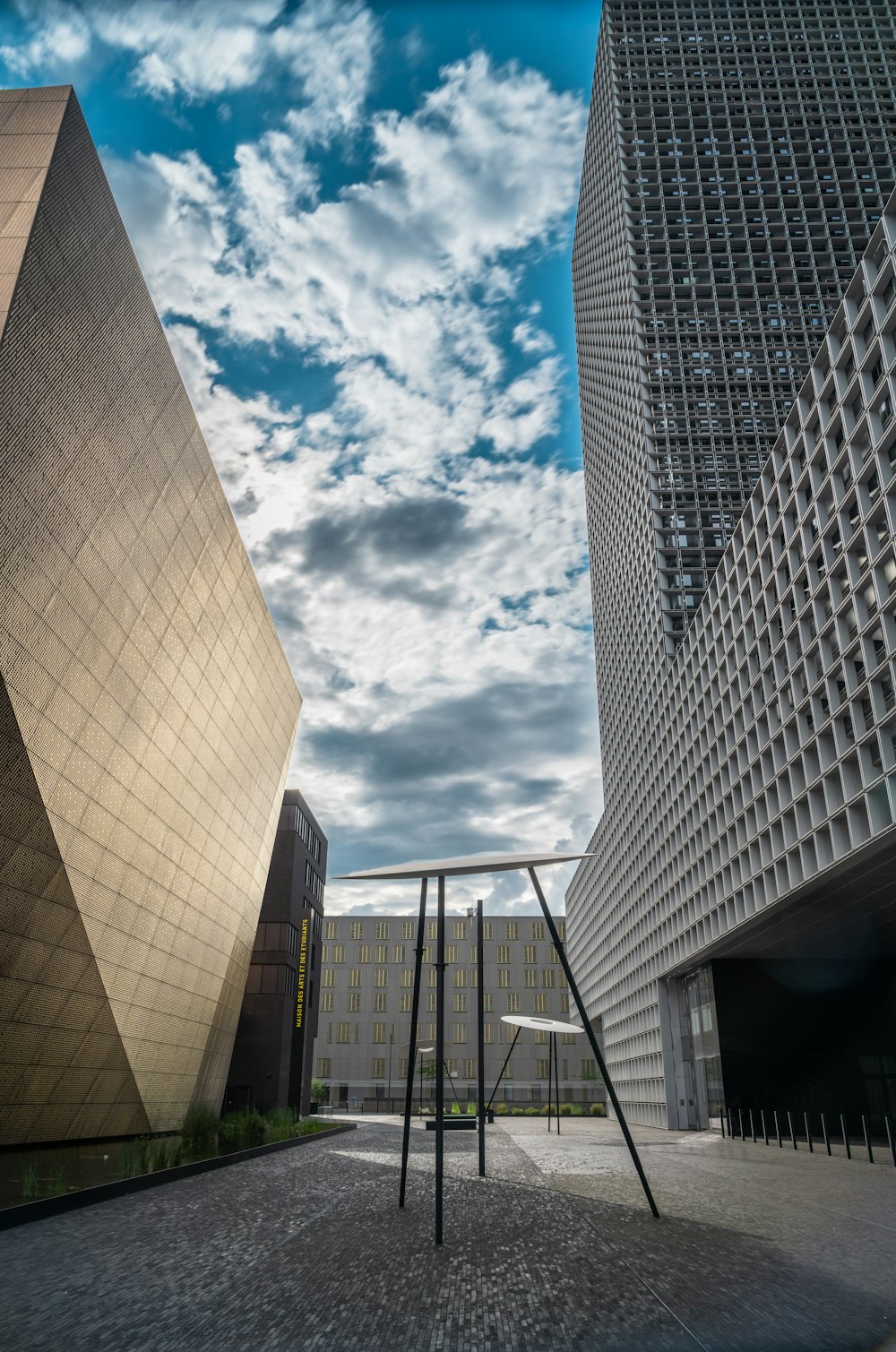 white and gray concrete building under blue sky during daytime