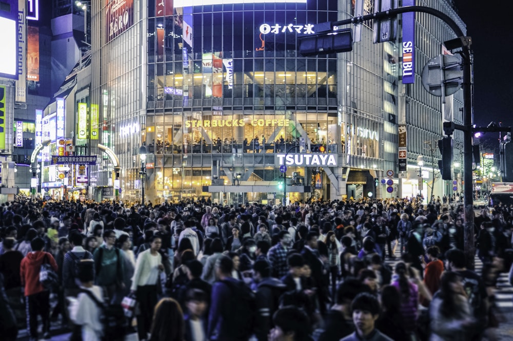 crowd of people on street during nighttime