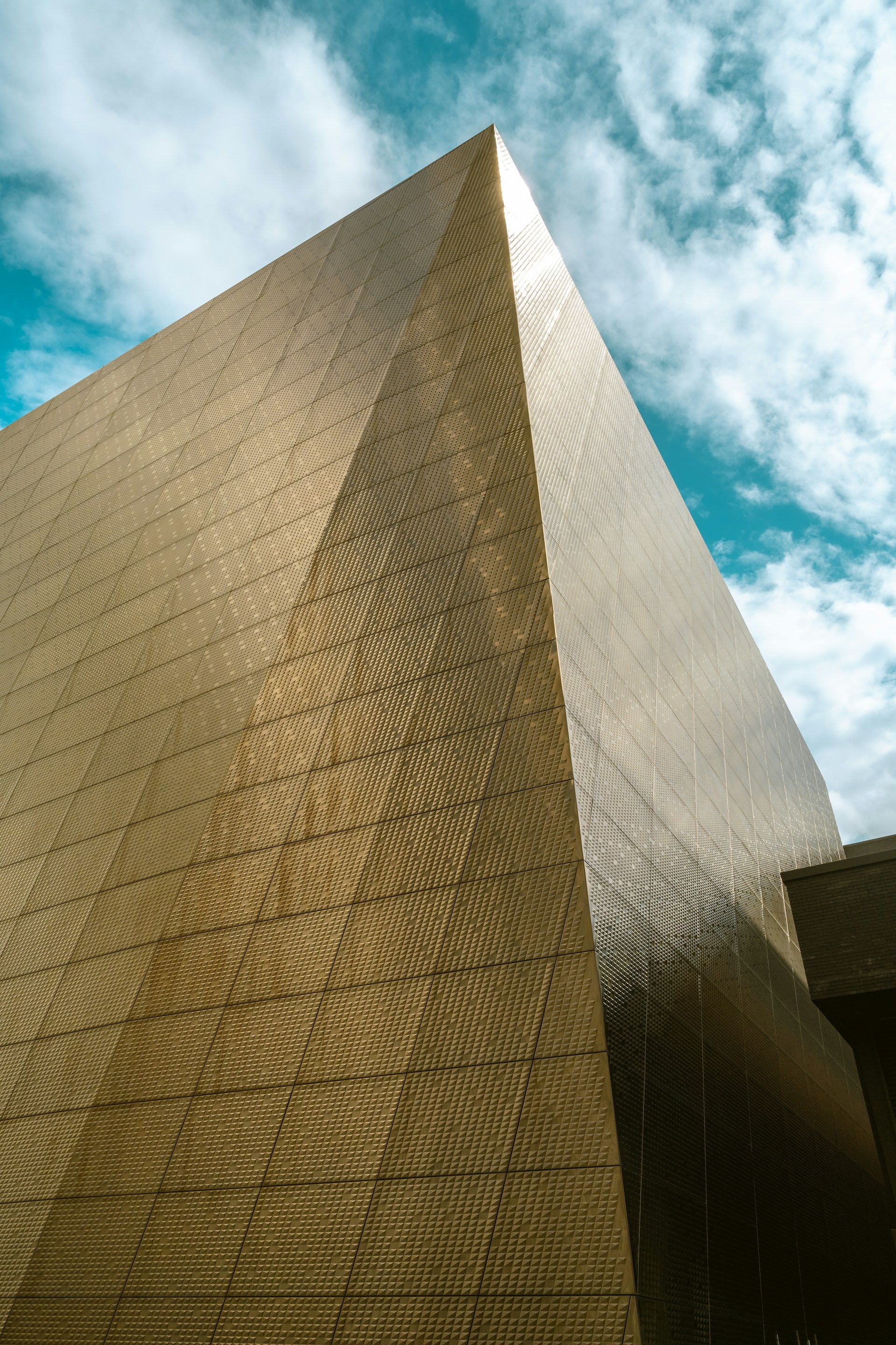 brown concrete building under blue sky during daytime