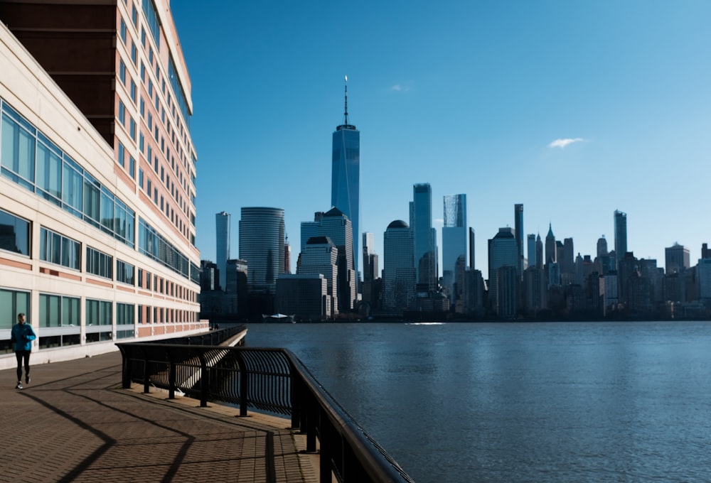 high rise buildings near body of water during daytime