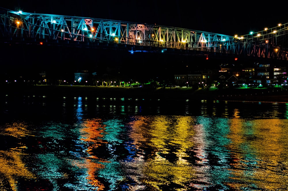 bridge over water during night time