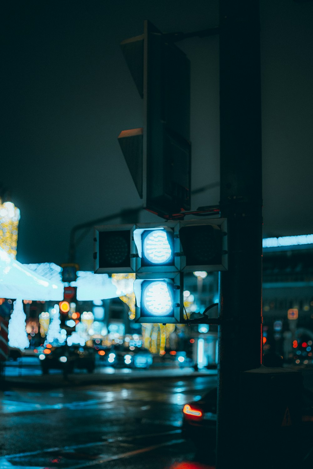 people walking on street during night time