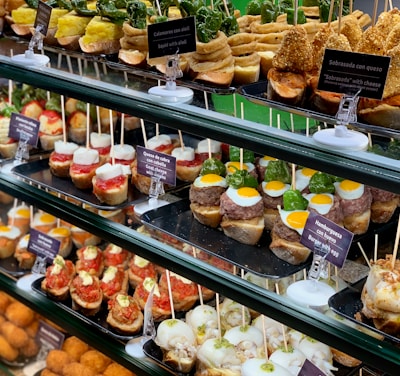 assorted pastries on white steel rack