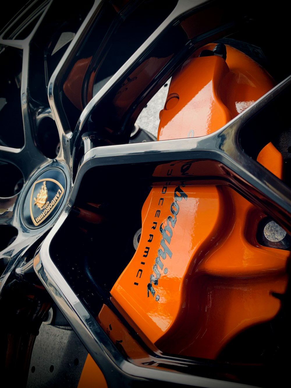 orange and black car steering wheel