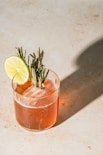 clear drinking glass with orange juice