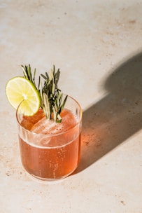 cocktail with herb garnish