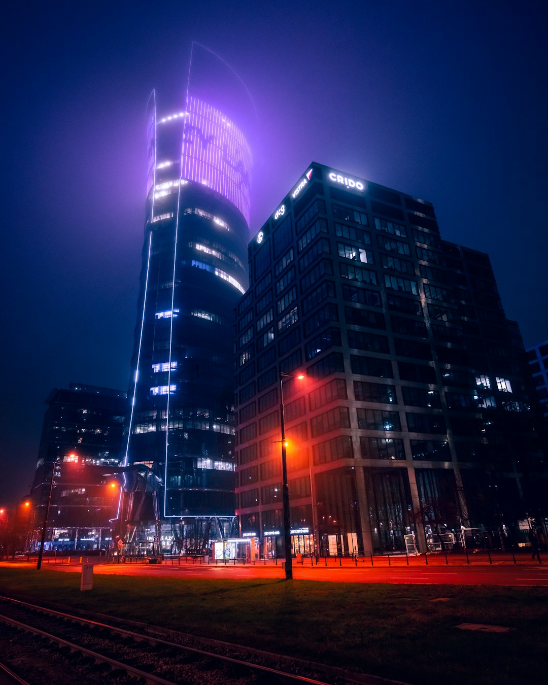 black and white concrete building during night time