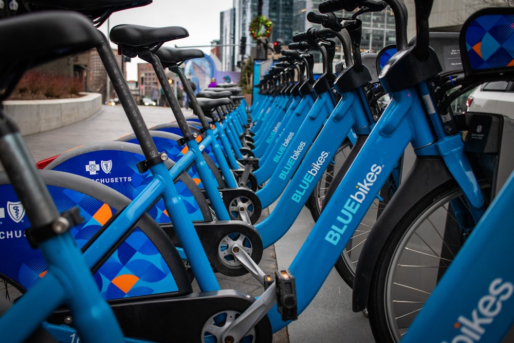 blue bicycle with black wheel