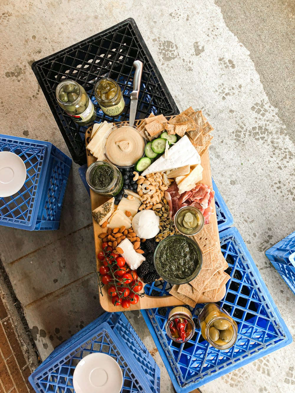 assorted food on blue plastic crate
