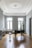 black grand piano near window