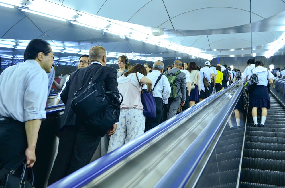 people walking on train station