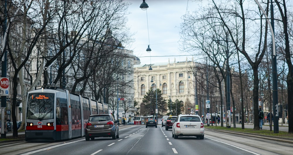 cars parked on roadside near building during daytime