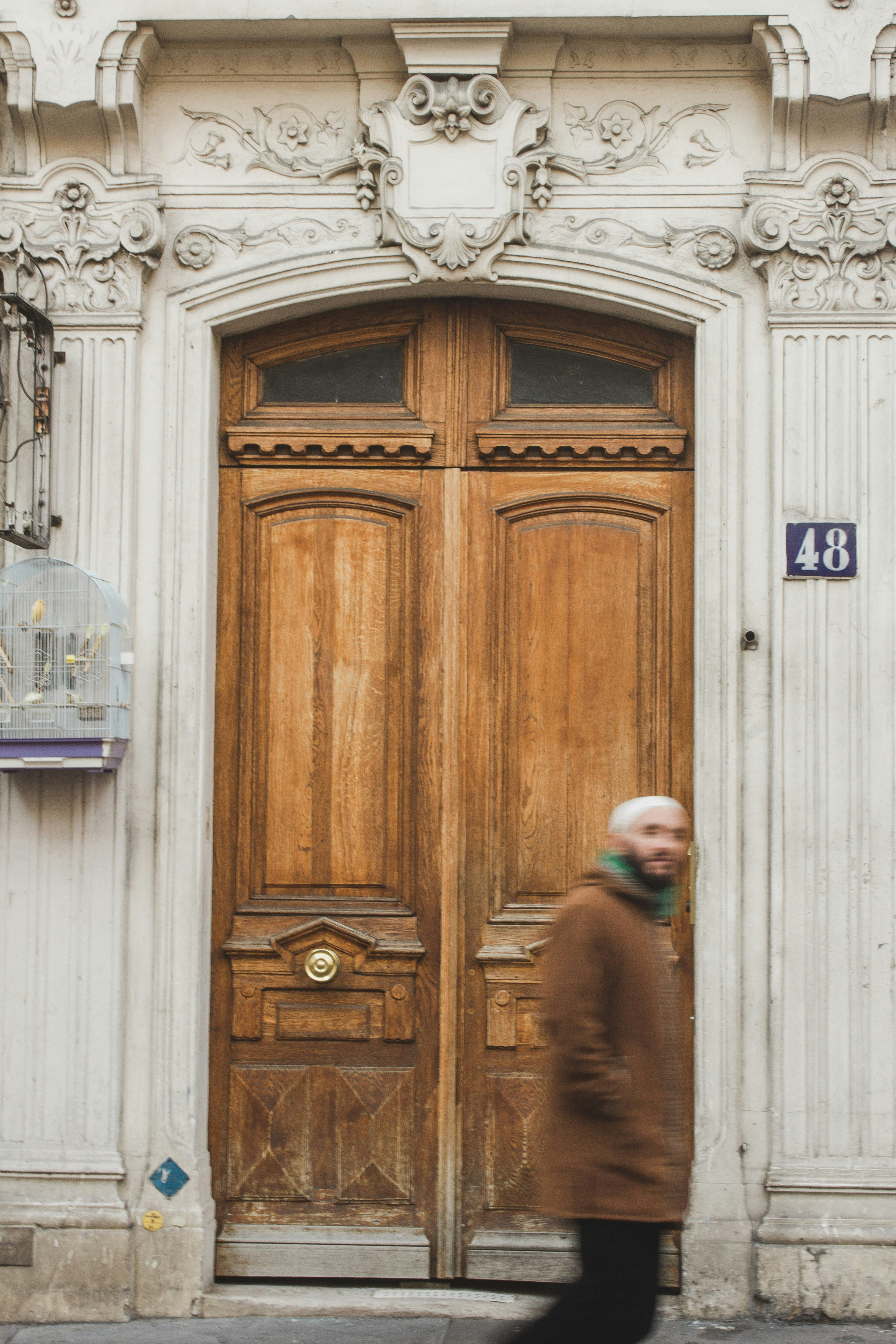 brown wooden door with water dispenser