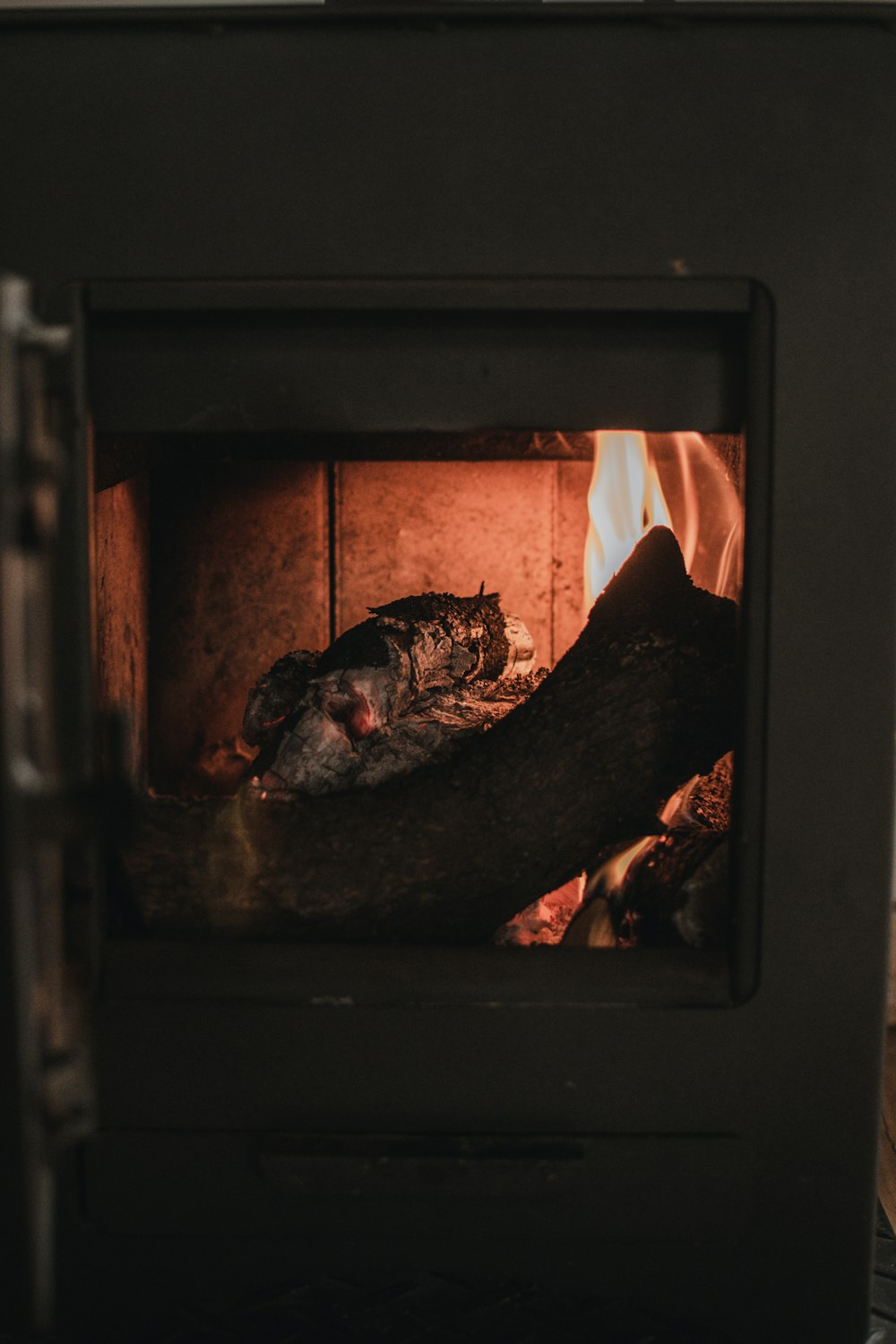 brown and black wood burner