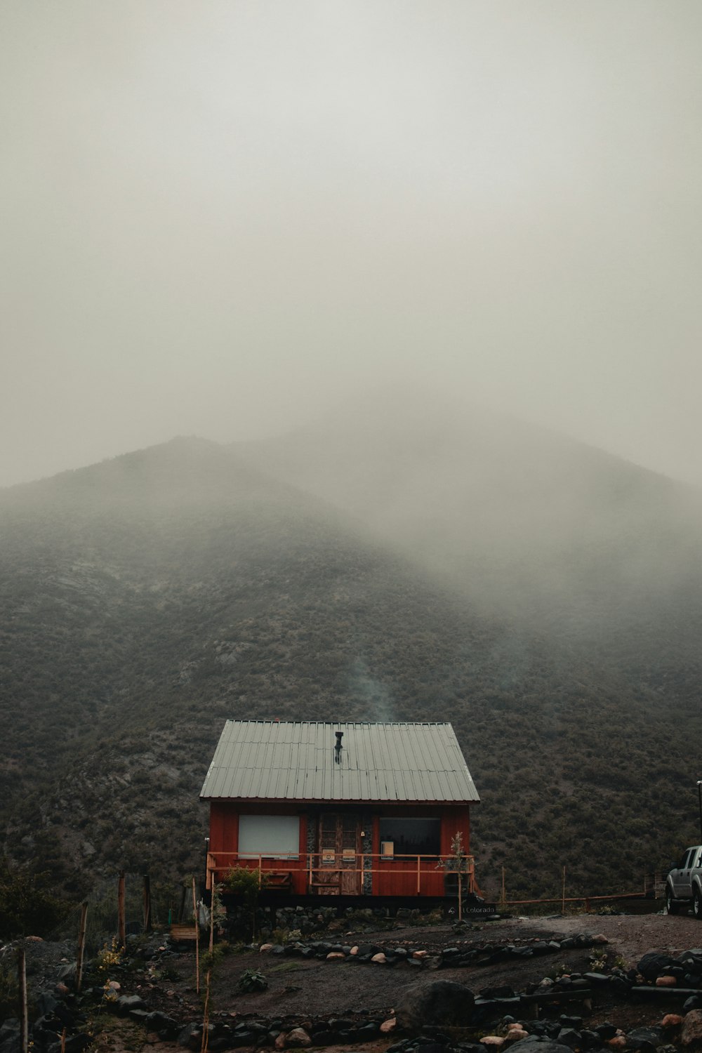 brown wooden house on top of mountain