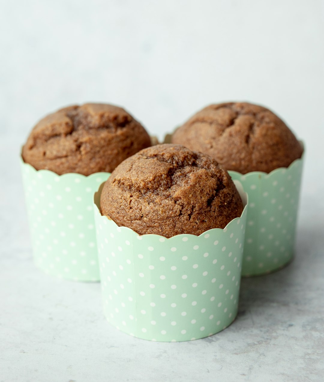 brown cookies on white and green polka dot cup