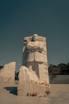 brown concrete statue during daytime