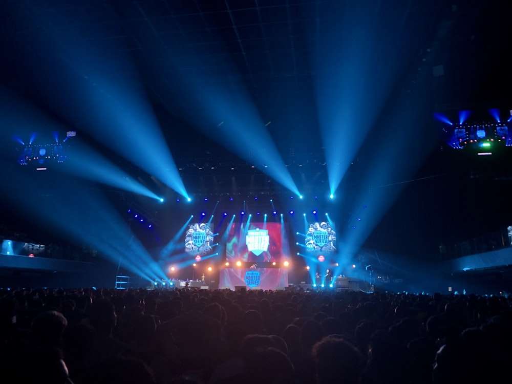 people watching concert during night time