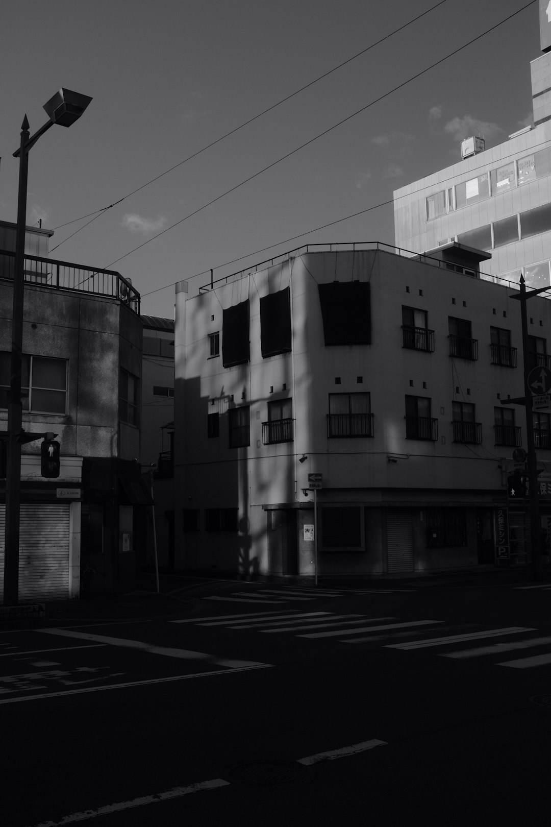 grayscale photo of concrete building