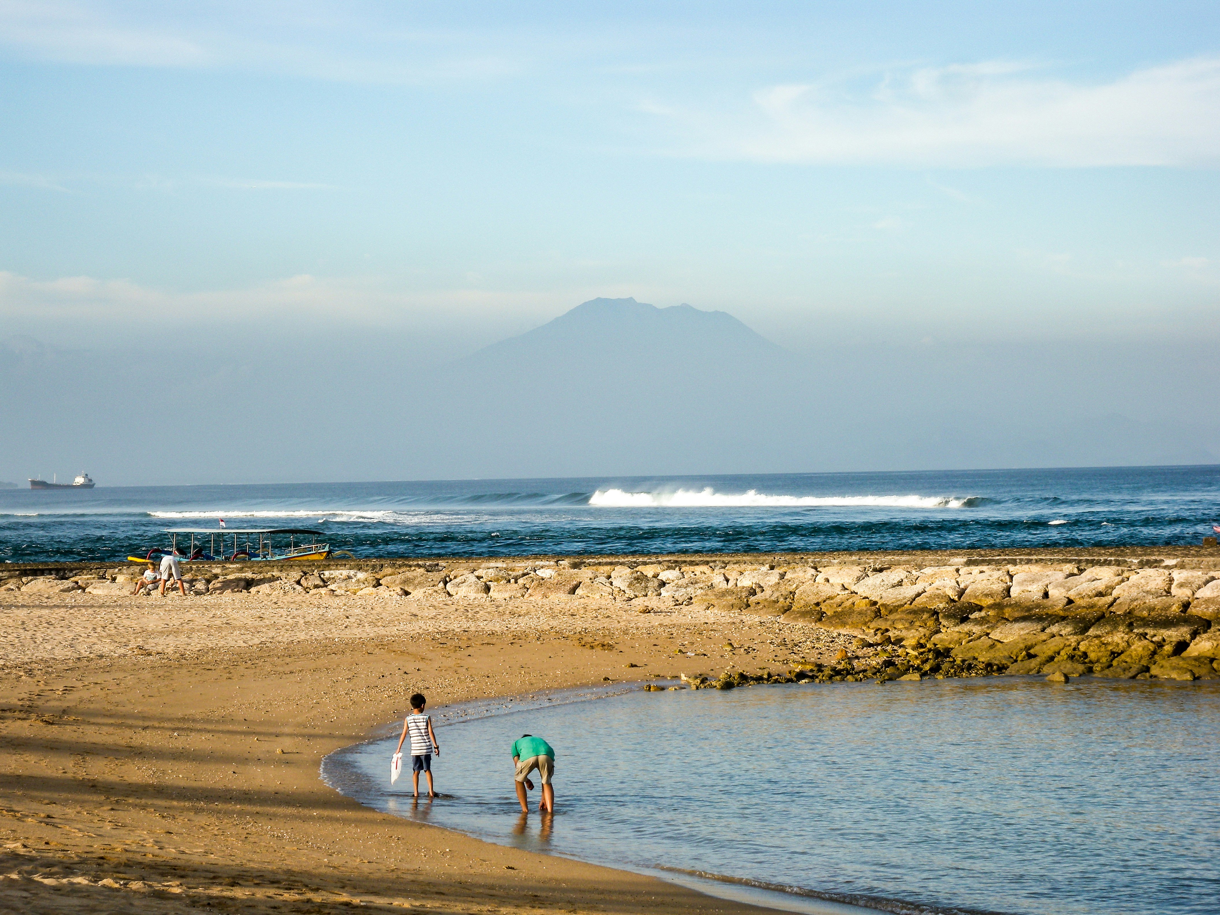 people walking on beach during daytime