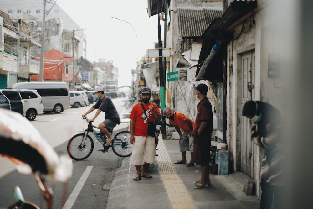 people walking on sidewalk during daytime