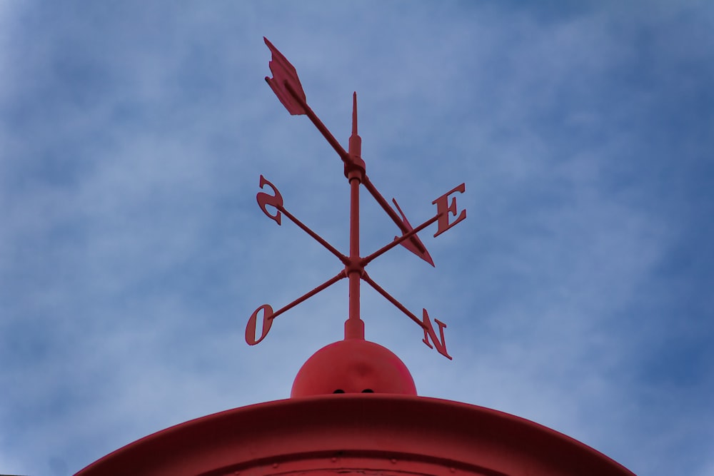 red round lamp under blue sky during daytime