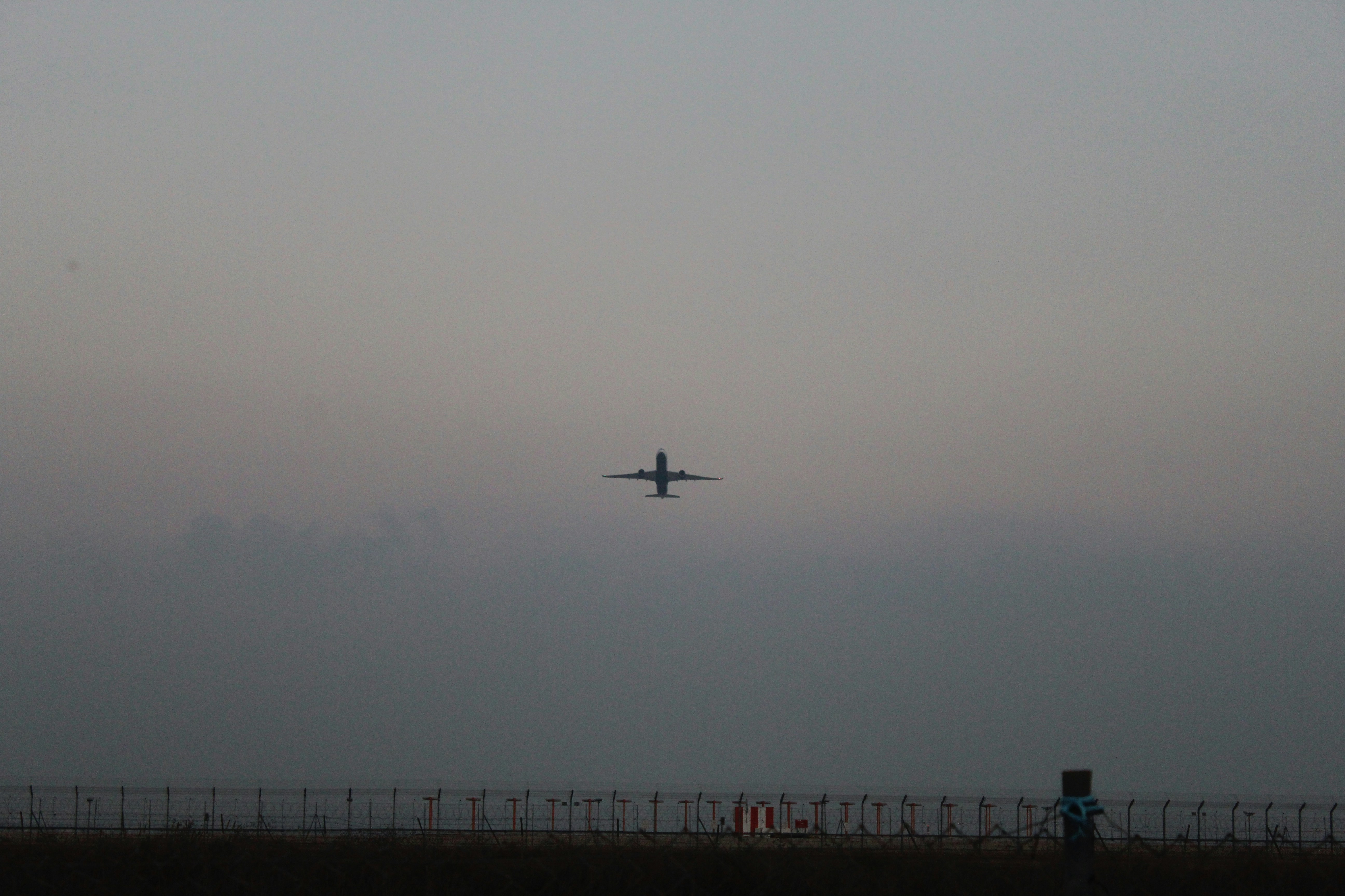 airplane flying over the sea