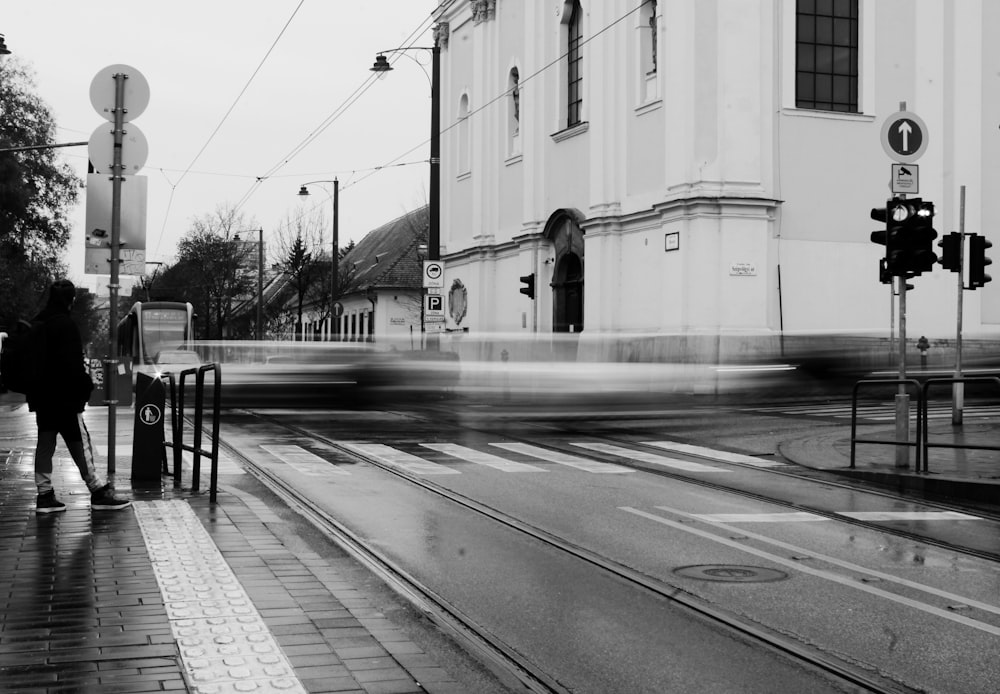 grayscale photo of a train station