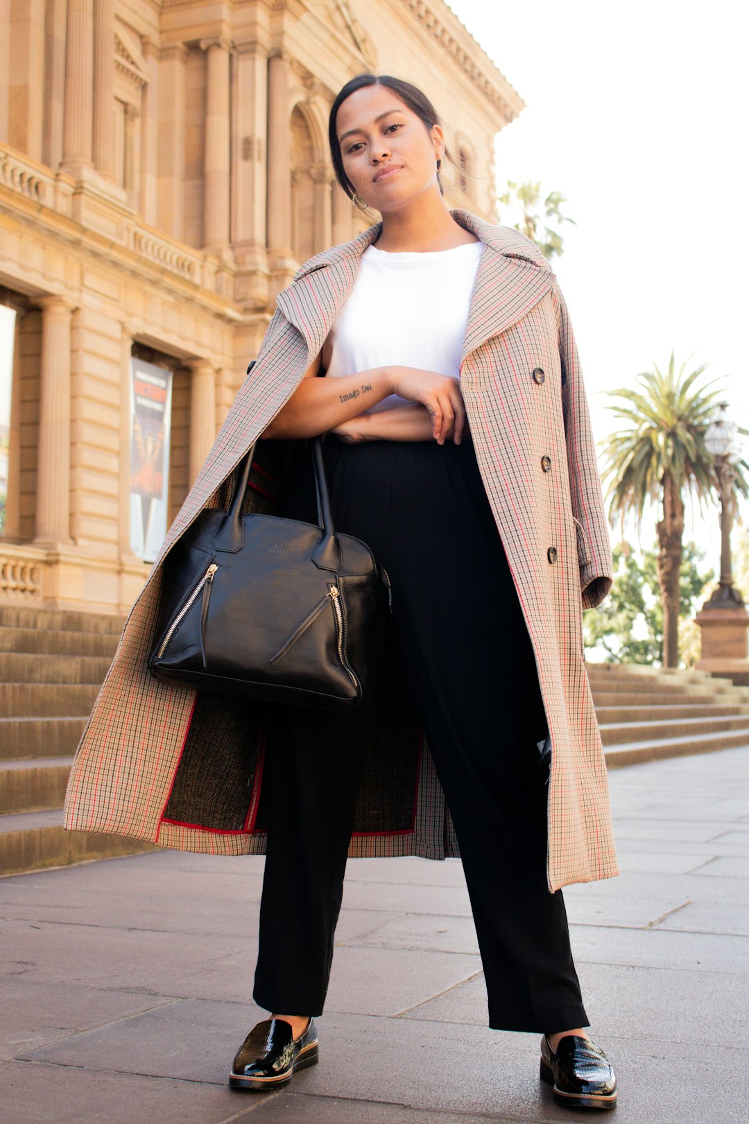 woman in black skirt and white turtleneck shirt