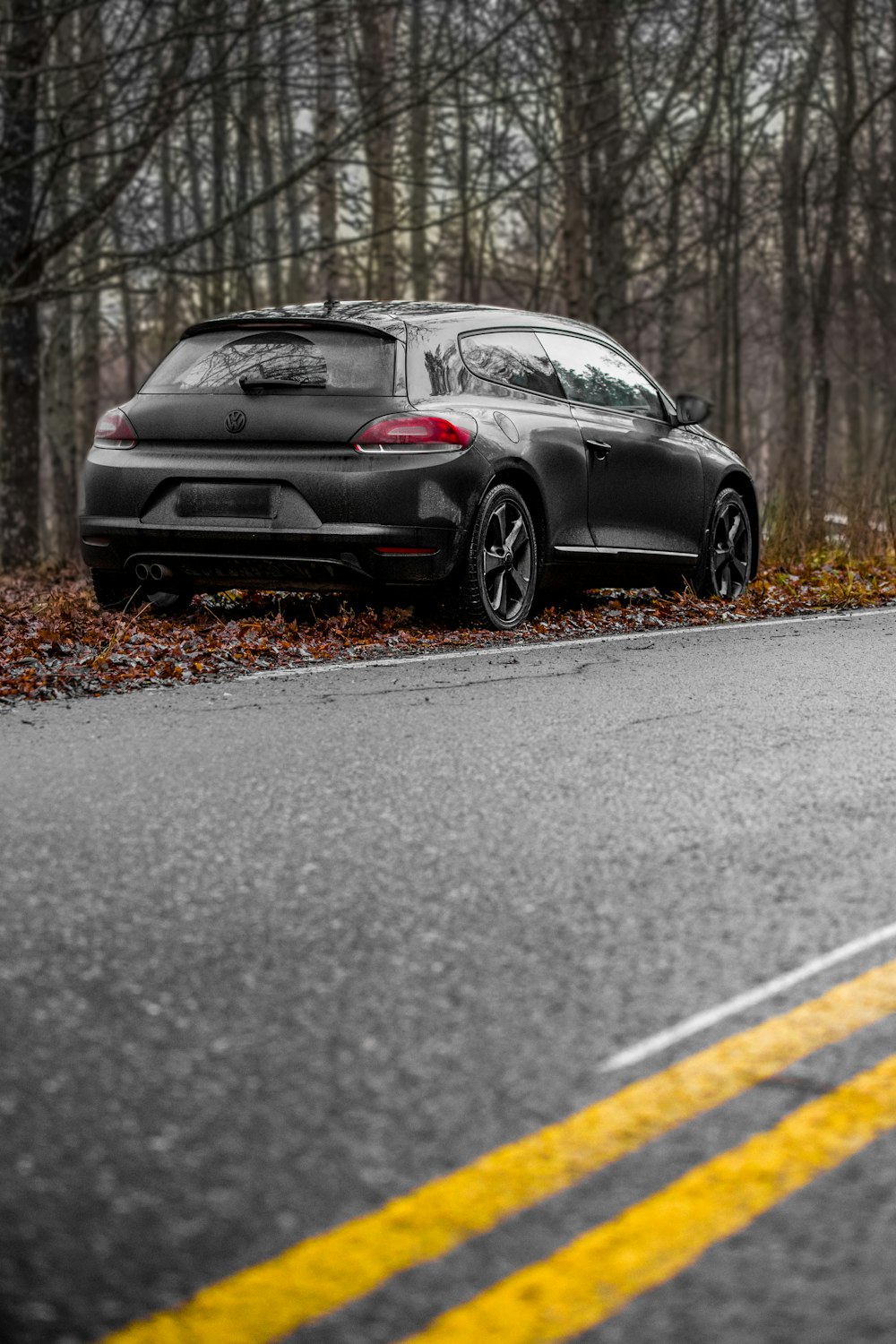 black porsche 911 on road during daytime