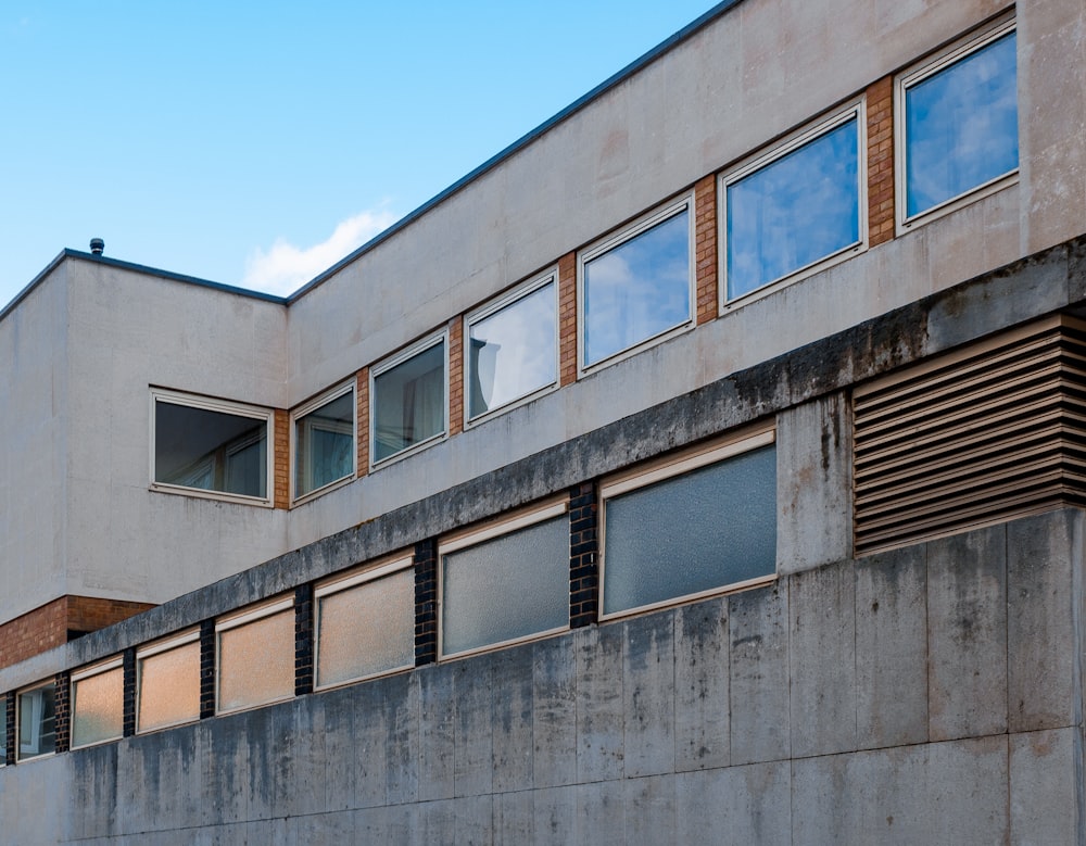 gray concrete building under blue sky during daytime