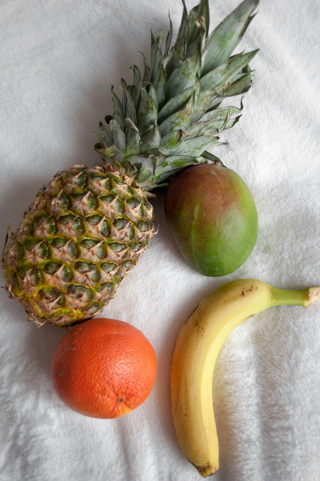 orange fruit and pineapple fruit