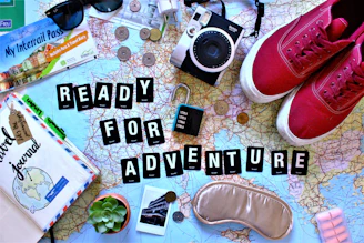 black and silver dslr camera on table