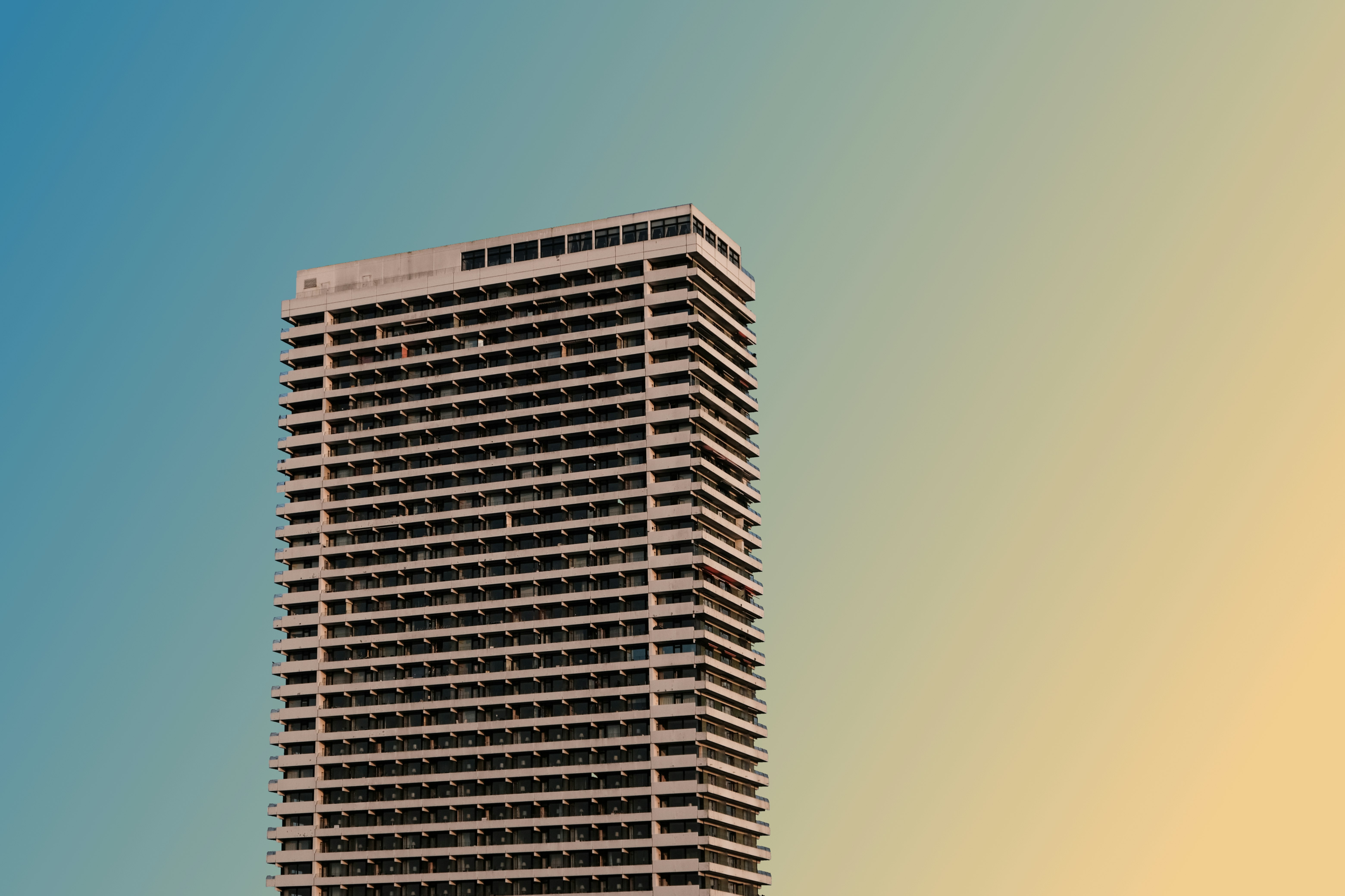 white concrete building under blue sky during daytime