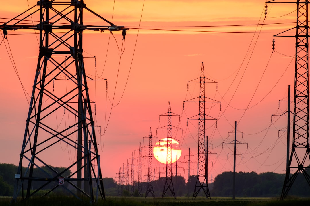 power line NP background of the sunset, a lot of supports for wires