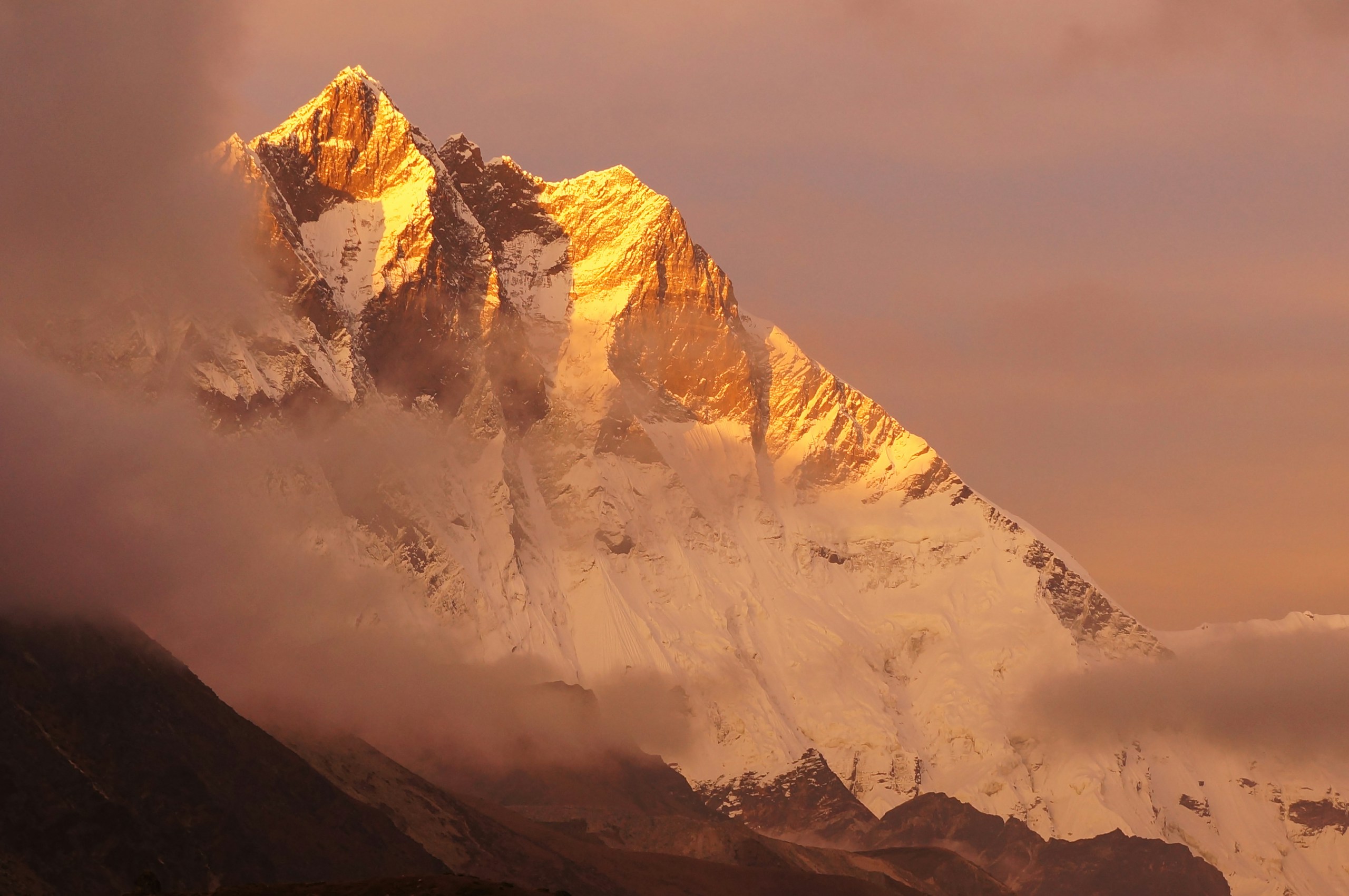 snow covered mountain during daytime