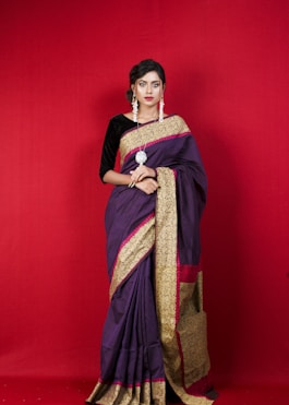 woman in red and brown sari