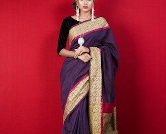 woman in red and brown sari