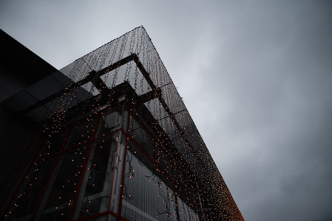 black glass walled high rise building