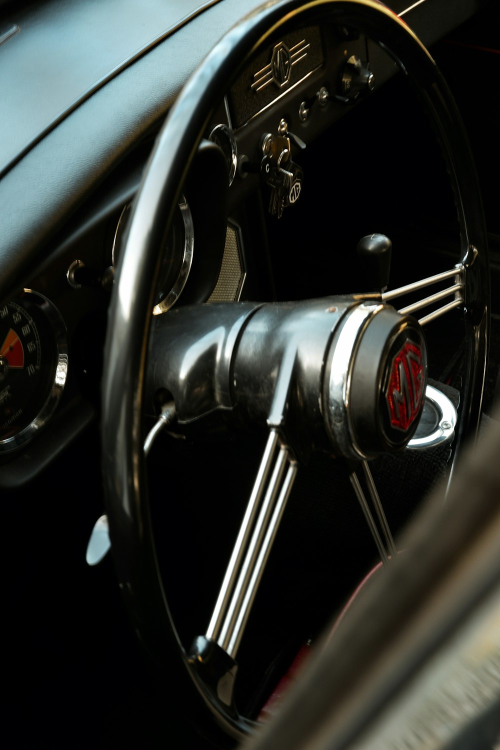 black and red car steering wheel