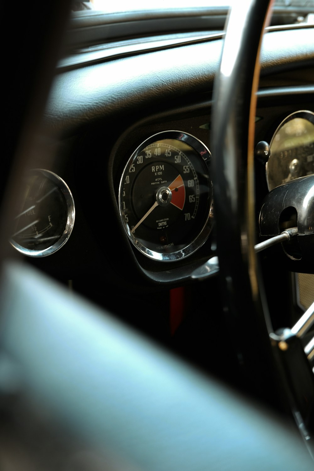 black and silver car steering wheel