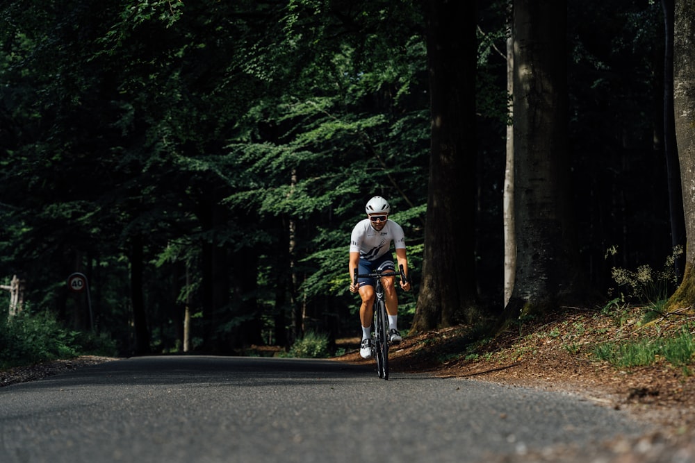 man in white jersey doing zone 2 training for cycling