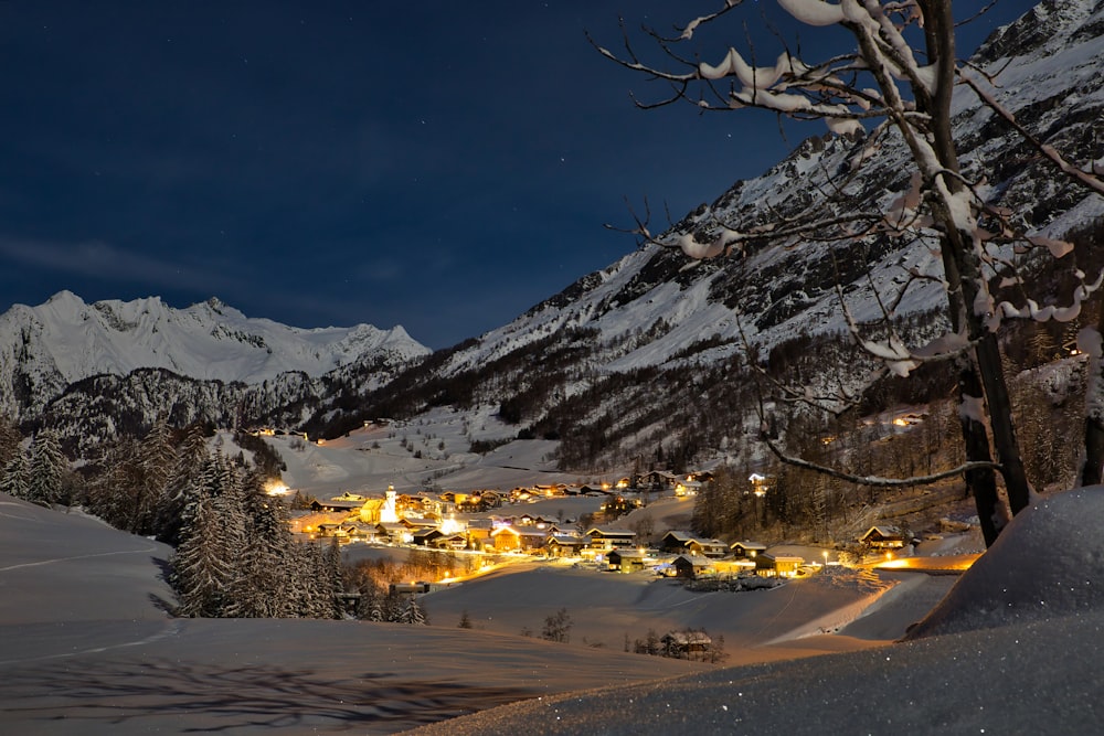 snow covered mountain during night time