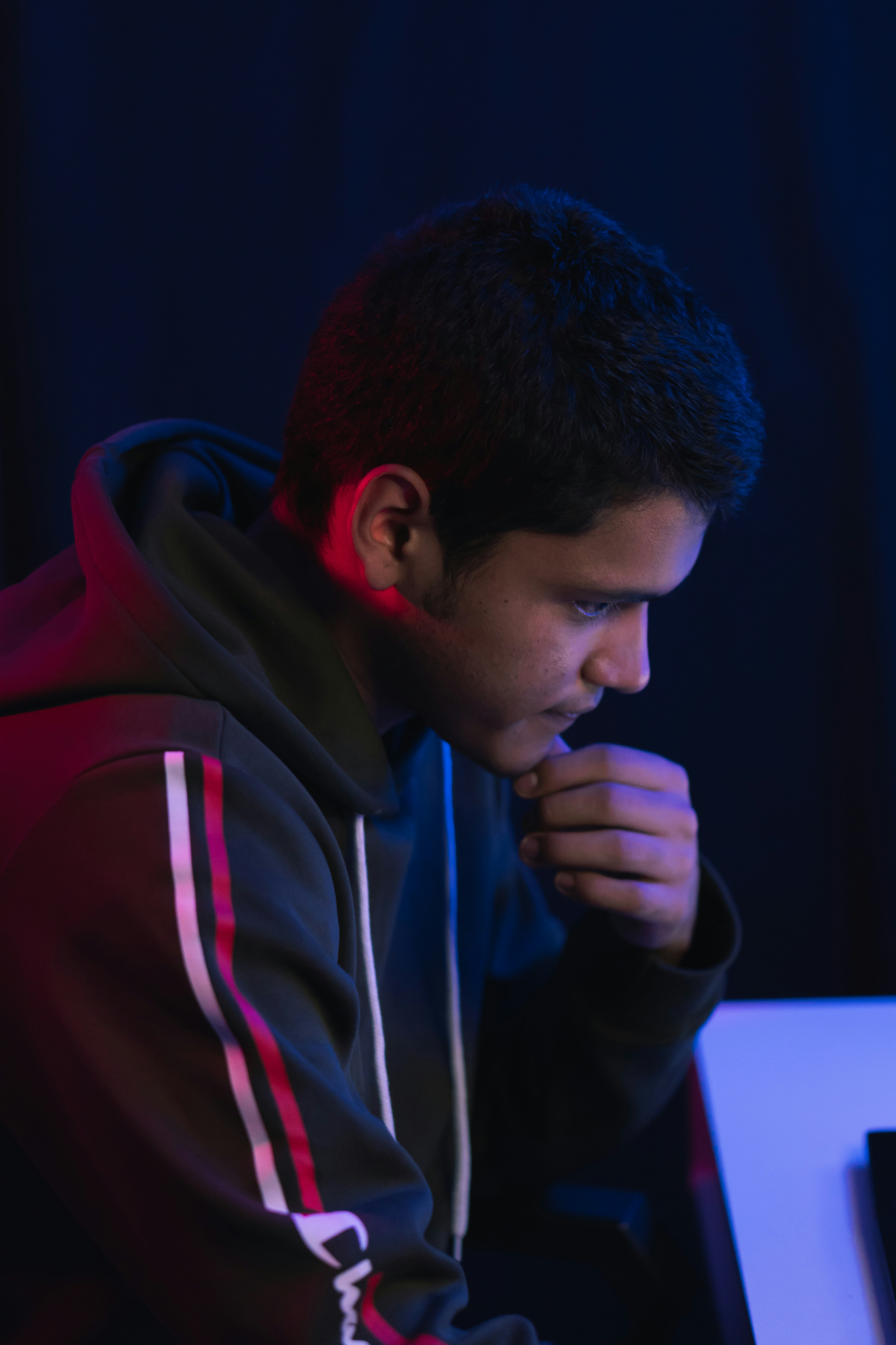 man in red and black hoodie