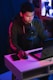 man in gray hoodie using black laptop computer