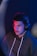 man in blue hoodie wearing black headphones