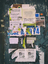 A colorful community bulletin board filled with event flyers and resource guides.