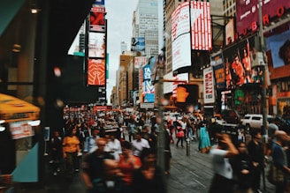 people walking on street during night time
